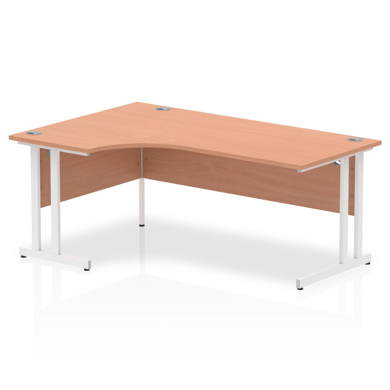 Dynamic Office Solutions 1800mm left corner desk with cantilever legs in beech and silver finish.