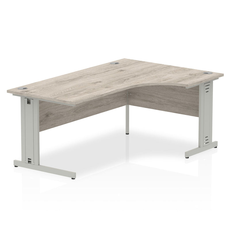 Crescent corner desk with cable managed leg in beech top and black leg by Dynamic Office Solutions