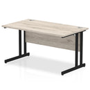 Dynamic Office Solutions 1400mm beech straight desk with cantilever legs in silver.
