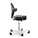 Black vinyl HAG Capisco 8106 ergonomic chair with adjustable height and silver aluminium base