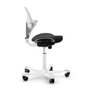 White HAG Capisco Puls 8020 ergonomic saddle chair with a unique design and adjustable seat height