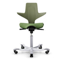 Green moss HAG Capisco Puls 8020 ergonomic saddle chair with silver aluminium base and adjustable gas lift.