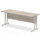 Dynamic Office Solutions 1800mm beech slimline desk with silver cantilever legs, ideal for modern home offices.