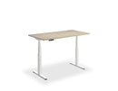Height adjustable desk by Lavoro with woodgrain top in Anthracite Sherman Oak and black frame.