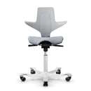 Light grey ergonomic HAG Capisco Puls 8020 saddle chair with silver aluminium base