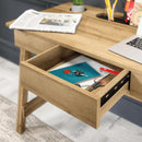Compact Teknik Ithaca Desk in natural wood finish, designed for home office use with sleek lines and functional storage.